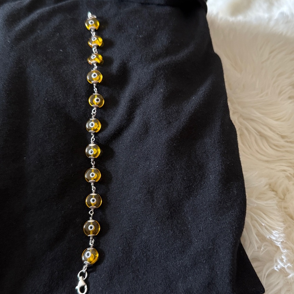 Yellow Beaded Bracelet. Evil eyes